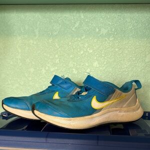 Nike Kids Sneakers in Blue and Yellow, size 13.5 kids - fair